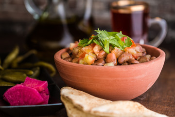 Foul Modammas Fava Beans with Bread and tea