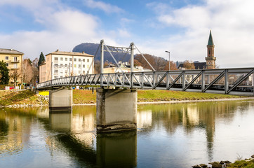Pedestrian Bridge and Reflection in Water on a Sunny Winter Day
