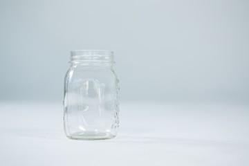 Close-up of empty glass jar