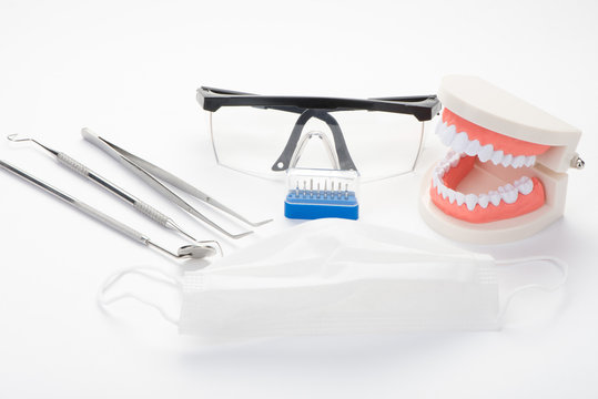 Modern dental office tools on a white background