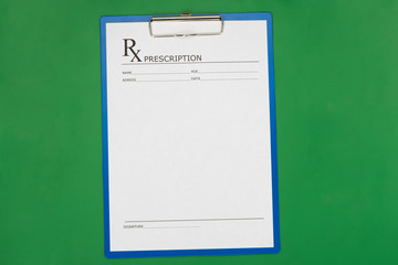 Blank prescription form on desktop background