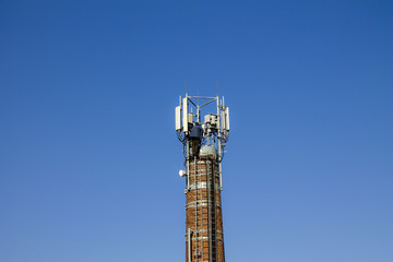 A man working at heights on the chimney