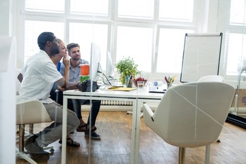 Graphic designers working at their desk