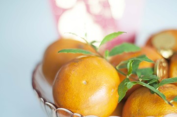 Happy Chinese New Year 2017 the year of the rooster with prosperity Mandarines oranges in glass...