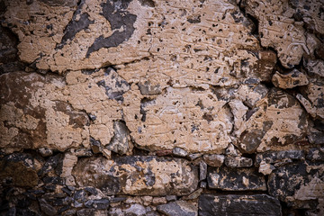 Dirty, scratched old brick wall