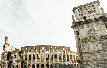Arch of Constantine and Colosseum at Rome.
