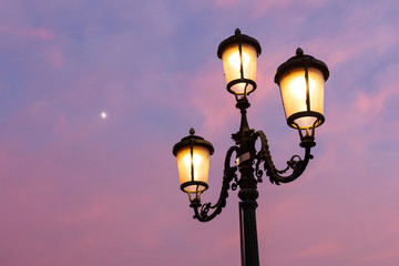 Fototapeta na wymiar Lamp post with twilight sky.