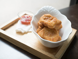 chicken nugget and delicious menu on beautiful plate in a restaurant.