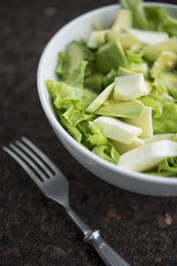 plate with fresh green salad