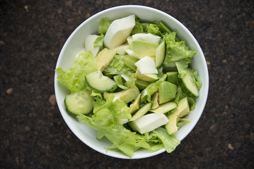 plate with fresh green salad