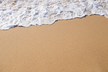 Fototapeta na wymiar Wave on the sand