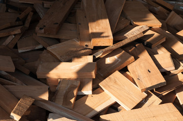Pile of wood logs for build Furniture production,sew natural wood scraps, ready to recycle and reuse process in improved waste management under efficient sustainable approach to save environment
