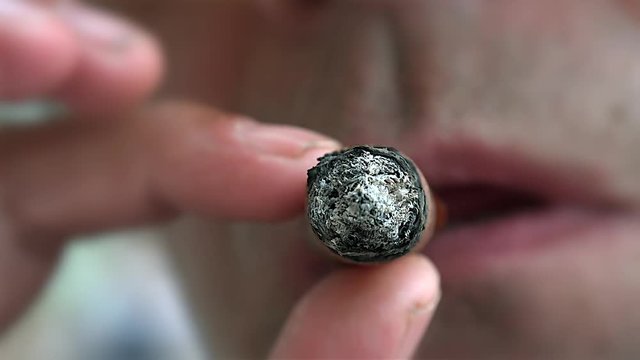 Man Cigar Smoking closeup. Cuba.