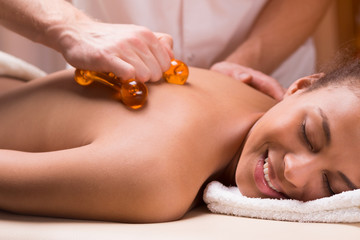 Woman having relaxing body massage