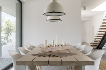 Dining table and white chairs