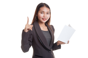 Young Asian business woman with a book have an idea.