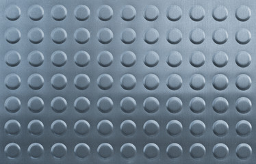 Metal background texture with round bumps