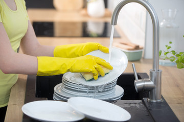  housework in the kitchen, dishwasher
