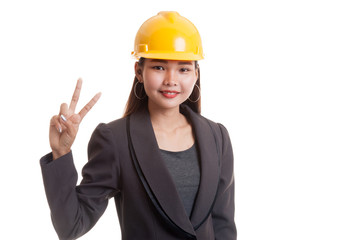 Asian engineer woman show Victory sign.