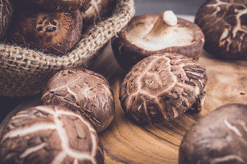 Shiitake mushroom on cutting board.