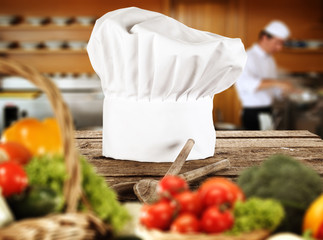 cook hat and kitchen interior 
