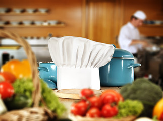 cook hat and kitchen interior 