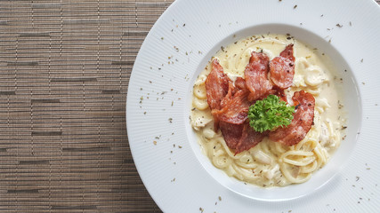 Spaghetti with bacon top view