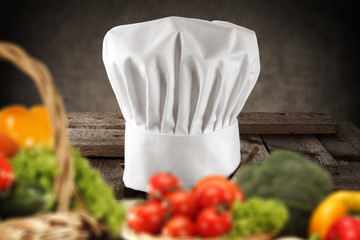 cook hat and kitchen interior 