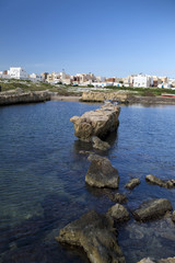 Naklejka premium View from the coastal town of Mahdia in Mahdia Governorate of Tunisia, eastern Mediterranean coast with ruins of Fatimid Caliphate and graveyard.