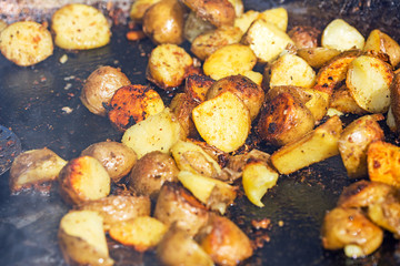 fried potatoes on the grill