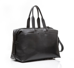 Black leather men travel bag on a white background