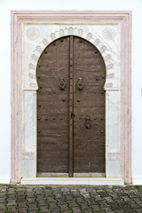 Traditional ornamental Tunisian door, detail from typical Mediterranean Arabic architecture