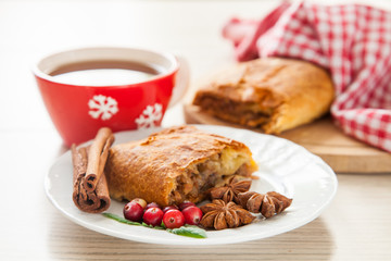 strudel with berries and nuts on a table, selective focus