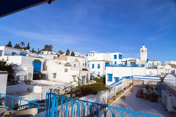 Typical Tunisian, Arabian, Mediterranean architecture in Sidi Bou Said, famous touristic town near Tunis, Tunisian capital.North African Mediterranean coast. © EnginKorkmaz