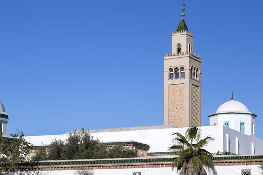 The minaret of La Marsa Mosque, Tunis the Tunisian capital in a colorful winter sunset. La Marsa is one of the most popular districts of Tunis province.