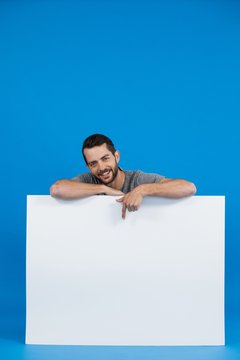 Handsome Man Holding A Blank Placard