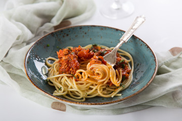 spaghetti tomato tuna on the table 