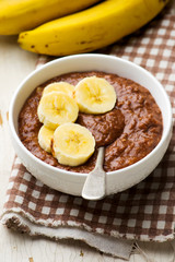 Healthy gooey chocolate banana oatmeal for breakfast