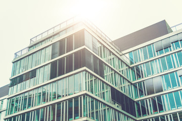 Fototapeta premium blue glass facade in sunlight