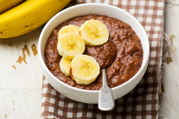 Healthy gooey chocolate banana oatmeal for breakfast