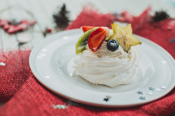 Beautiful white dessert on a red napkin