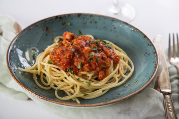 spaghetti tomato tuna on the table 
