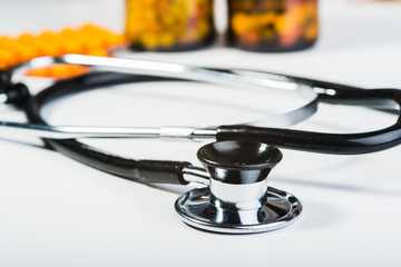 Medical stethoscope on a white background.