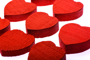 wooden valentine hearts in line