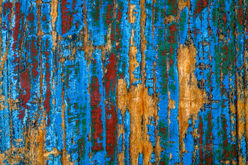 Color picture of a old board with peeling paint layers - 132246823