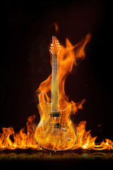 Beautiful seven-string guitar on fire on a black background
