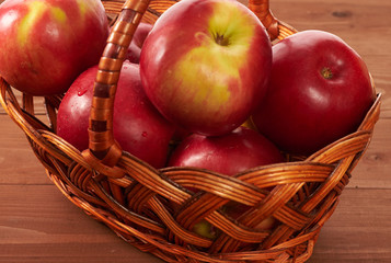 red apples on a wooden table