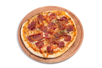 Big appetizing pizza on a wooden tablet
