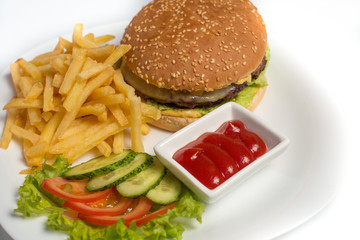 Hamburger with french fries on a white background