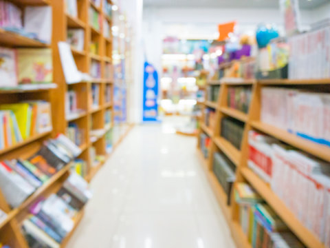 Blurred books on shelves in store